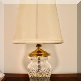 D023. Small crystal and brass lamp. Shade is ripped on inside. 12.5” - $38